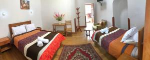 Voodi või voodid majutusasutuse Casa Union Cusco toas