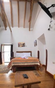 Voodi või voodid majutusasutuse Casa Union Cusco toas