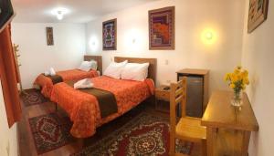 Voodi või voodid majutusasutuse Casa Union Cusco toas