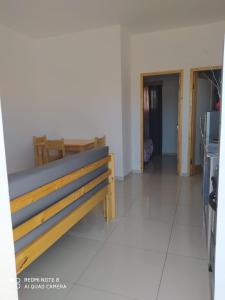 Rúm í herbergi á Guest House Maio