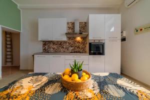 Kuchyňa alebo kuchynka v ubytovaní Civico Dieci Holiday Home