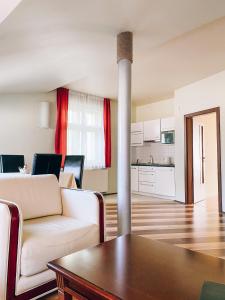 Kuchyň nebo kuchyňský kout v ubytování Riverside Apartments Thalia
