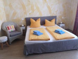 Säng eller sängar i ett rum på Haus Strandburg