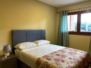 Postelja oz. postelje v sobi nastanitve Aparthotel Los Laureles