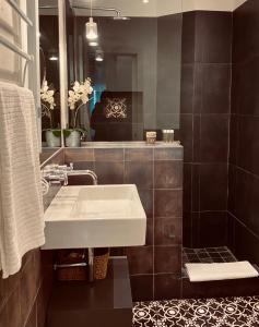 Koupelna v ubytování Apartamentos Caravane