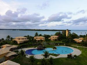 an aerial view of a resort with a large swimming pool at Village Club Premium - ePipa Hotéis in Pipa