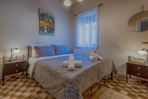 Ένα ή περισσότερα κρεβάτια σε δωμάτιο στο Pefkos House