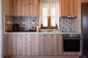 Η κουζίνα ή μικρή κουζίνα στο Pefkos House