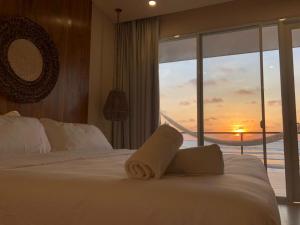 Ένα ή περισσότερα κρεβάτια σε δωμάτιο στο Hotel Kundalini