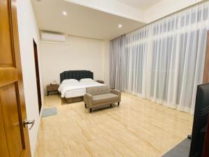Cama ou camas em um quarto em 鸚鵡民宿