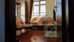 Ein Bett oder Betten in einem Zimmer der Unterkunft Soleil Couchant No 2