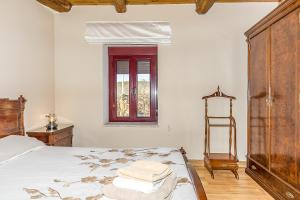 Säng eller sängar i ett rum på Casa Ucedo