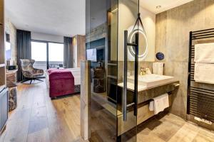 Postel nebo postele na pokoji v ubytování Hotel Bergland