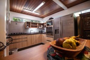 Kuchyň nebo kuchyňský kout v ubytování Spazio del Sole Jurere