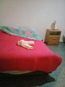 Łóżko lub łóżka w pokoju w obiekcie Posada Mis Padres