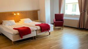 Postel nebo postele na pokoji v ubytování Hotell City