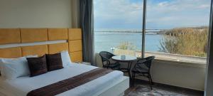 Postel nebo postele na pokoji v ubytování Aquarius Touristic Resort + 37 fotografií