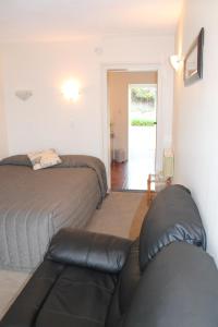 Postel nebo postele na pokoji v ubytování Riverview Motel