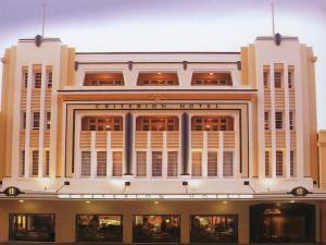 a large white building with many windows at Criterion Hotel Perth in Perth