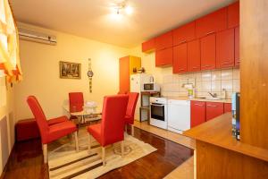 Kuchyň nebo kuchyňský kout v ubytování Apartman JOZIC