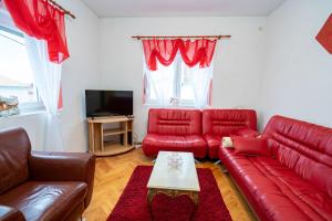 TV a/nebo společenská místnost v ubytování Apartman JOZIC
