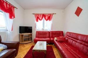 TV a/nebo společenská místnost v ubytování Apartman JOZIC