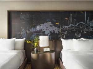 a room with a bed and a painting on the wall at Park Lane New York in New York