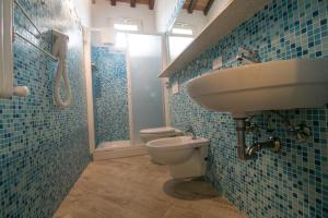 A bathroom at Fattoria Palazzeta - Pet & Family Friendly