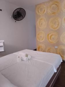 Postel nebo postele na pokoji v ubytování Casa Dunas Cabo Frio