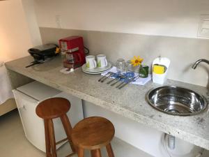 Кухня или мини-кухня в Suites Amma Noronha
