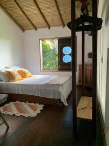 Postel nebo postele na pokoji v ubytování Casa Eco Vila