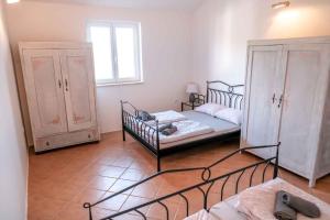 Posteľ alebo postele v izbe v ubytovaní Holiday home in Vrbnik - Insel Krk 42239 + 37 fotografií