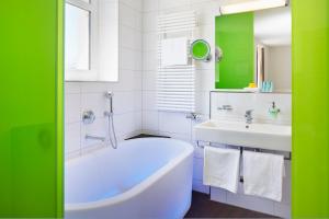 A bathroom at Sorell Hotel Rütli