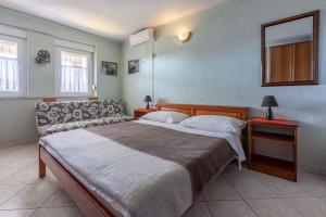 Postel nebo postele na pokoji v ubytování Studio in Crikvenica 42250