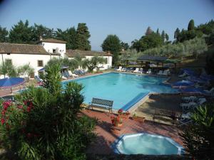 Bazén v ubytovaní Holiday Homes in Pelago - Toskana 42338 alebo v jeho blízkosti