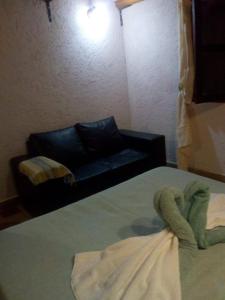 Ein Bett oder Betten in einem Zimmer der Unterkunft Architerra