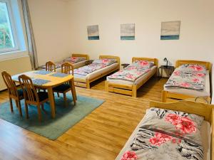 Postel nebo postele na pokoji v ubytování Penzion Kelčany u Kyjova + 37 fotografií