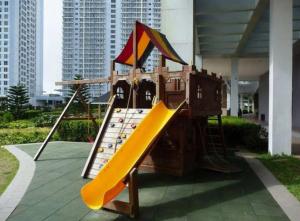 a playground with a slide in a building at Wind Residence Designer Appt overlooking Taal lake - Tower 1 - 42sqm in Tagaytay