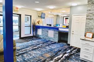 Η κουζίνα ή μικρή κουζίνα στο Coratel Inn & Suites by Jasper Northfield