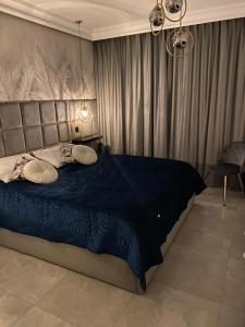 Posteľ alebo postele v izbe v ubytovaní MALAGA APARTAMENTY BALTICUS