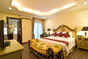 Postel nebo postele na pokoji v ubytování LK Royal Suite + 37 fotografií