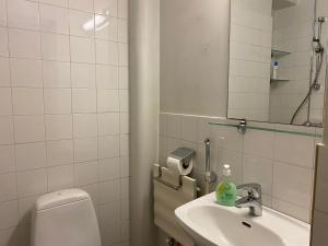 Koupelna v ubytování Aalto Apartments Sunila Honkala 1