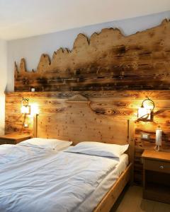 Postel nebo postele na pokoji v ubytování Hotel Garni Relax