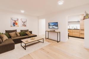 TV a/nebo společenská místnost v ubytování Bergkranz Apartments
