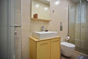 Koupelna v ubytování City Pearl Dntwn Apts