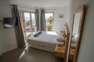 Postel nebo postele na pokoji v ubytování Panoramic sea view apartment + 37 fotografií