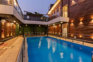 Bazén v ubytování Amara Oceanfront Resort & Club Baga nebo v jeho okolí