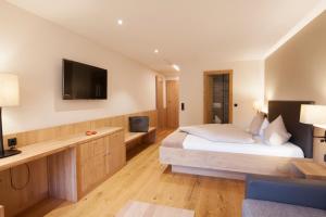 TV a/nebo společenská místnost v ubytování Relax & Vitalhotel Adler