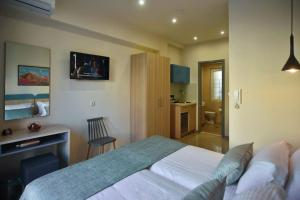 Postel nebo postele na pokoji v ubytování City Pearl Dntwn Apts