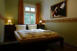 Tagungszentrum-Allerheiligen Hotel Löwenherzにあるベッド